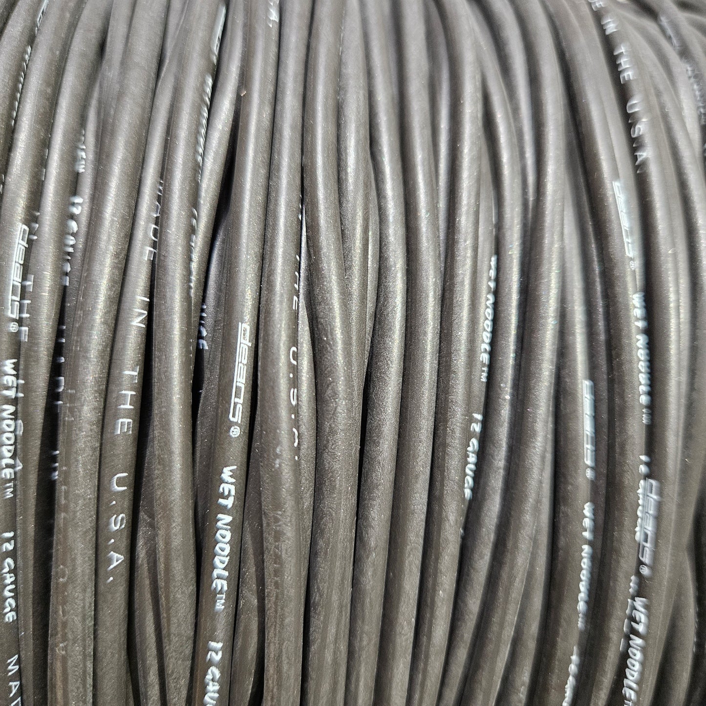 30' Black 12 Gauge Wet Noodle Coiled